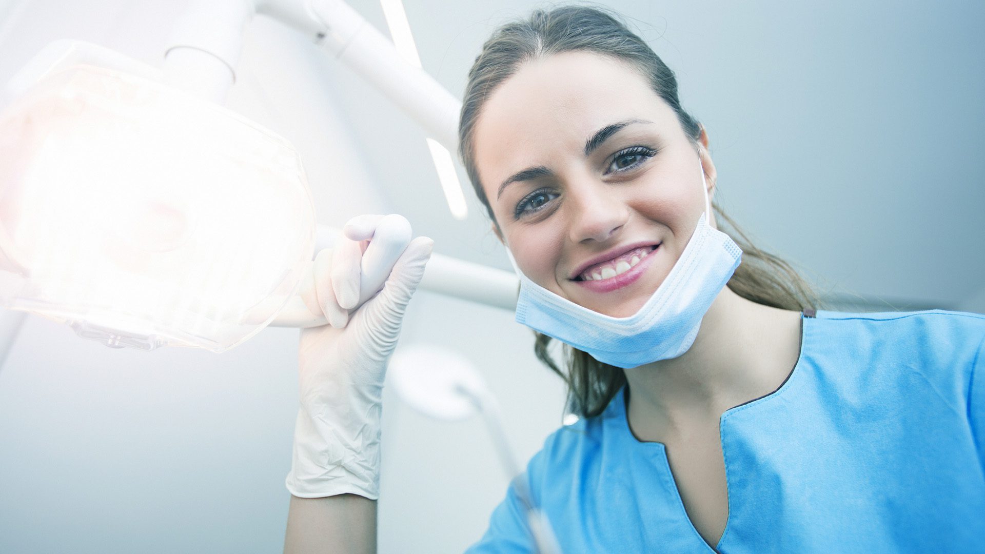 Dentist checking the patient teeth.