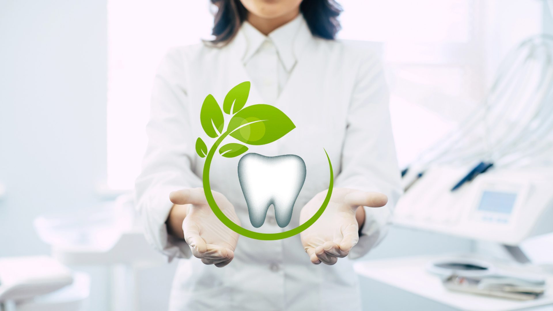 Close up photo of the Dentist hands on work place background, medical professional handed holding virtual dental object or item product. Healthcare and advertisement concept, copy space.